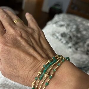 Enewton set of 4 bracelets . 3 with green onyx and one in gold w/ small crosses